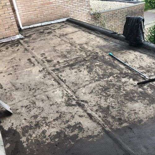 Schoonmaken van een plat dak in Schijndel Schoonmaken van een plat dak in Schijndel